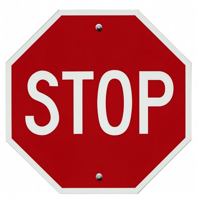 Red stop sign in bright daylight