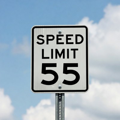 Speed limit sign in clear sky