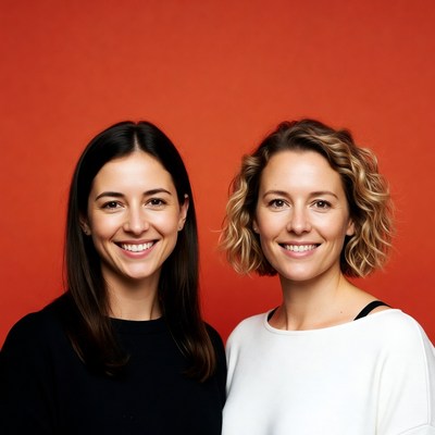 Two friends with bright smiles