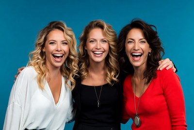 Smiling women in colorful outfits