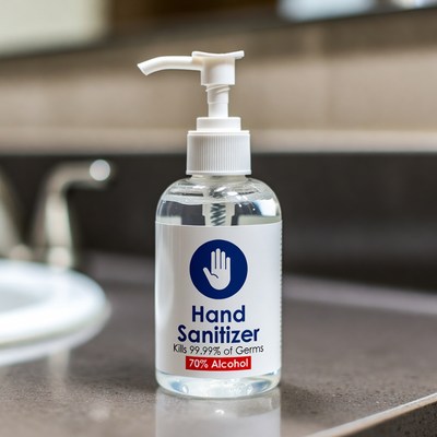Hand sanitizer on a bathroom counter
