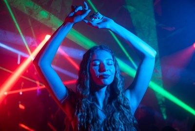 Dancing under colorful lights