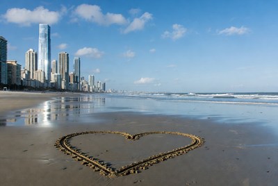 Heart drawing on beach in city