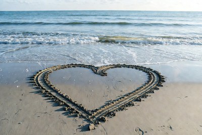 Heart shape drawn in sand