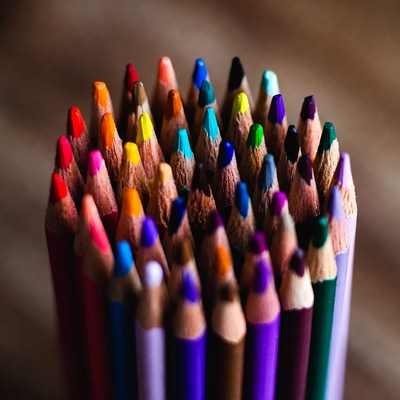 Colorful art supplies arranged neatly