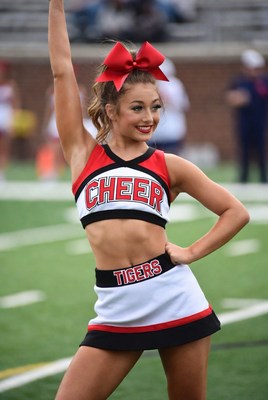 Cheerleader performing at game