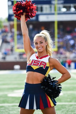 Cheerleader performs at sports event