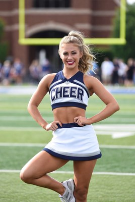 Cheerleader performing on field