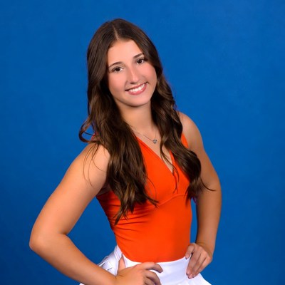 Cheerful young woman posing brightly