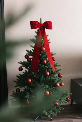 Christmas tree with red ornaments and bow