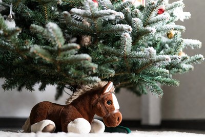 Plush horse under christmas tree