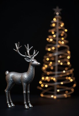 Silver reindeer with glowing tree