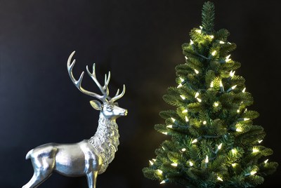 Silver deer and christmas tree display
