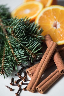 Cinnamon, orange, and pine arrangement