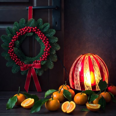 Festive wreath and orange arrangement