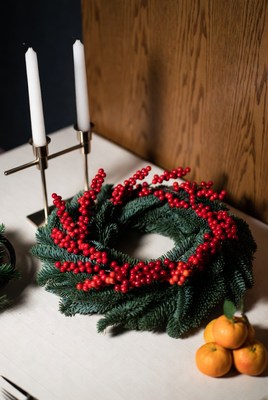 Holiday wreath with berries and fruit