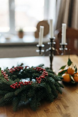 Holiday wreath on dining table