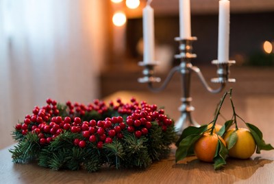 Holiday wreath and candles centerpiece