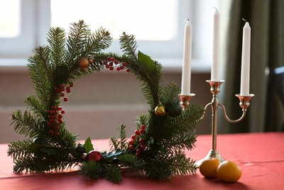 Festive wreath and candle display