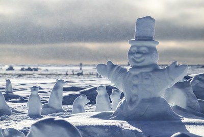 Winter scene with snowman and animals