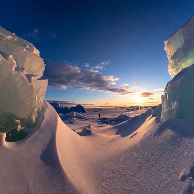 Sunrise over icy landscape