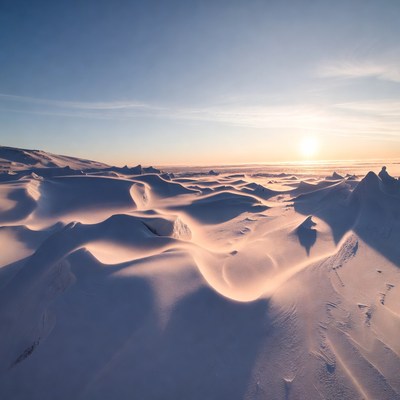 Snowy landscape at sunset in winter