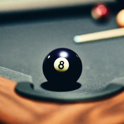 Black 8 Ball on Pool Table