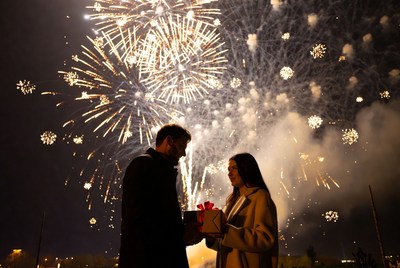 Couple celebrating with fireworks