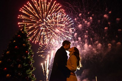 Celebration under vibrant fireworks