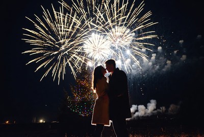Couple enjoying fireworks display