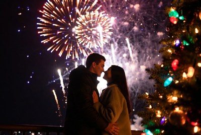 New year's eve kiss with fireworks