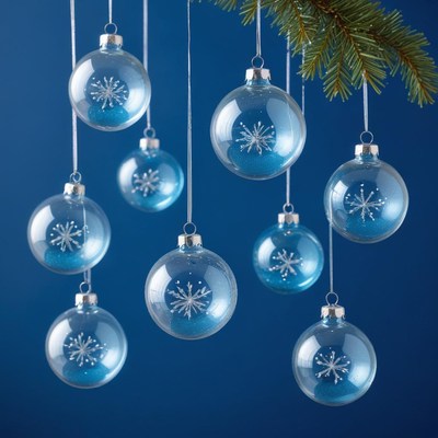 Blue and clear holiday ornaments hanging