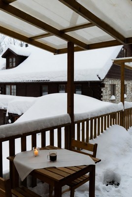 Cozy winter balcony view at a cabin