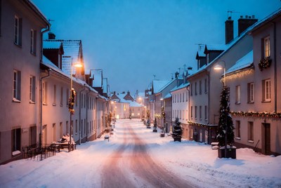 Snowy street at twilight in winter