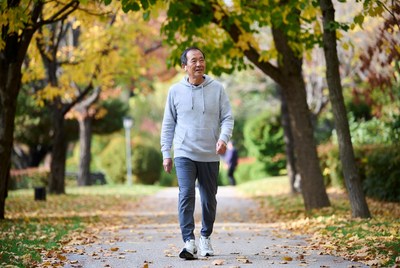 Man walking in autumn park