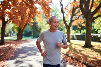 Running in autumn park scene