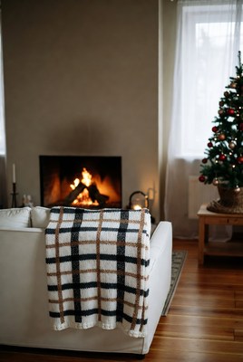 Cozy living room with fireplace and christmas tree