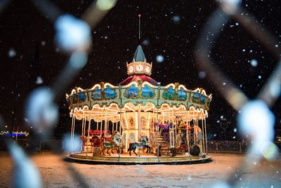 Snowy carousel at night