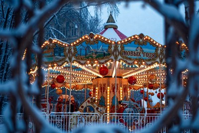 Winter carousel in a snowy park