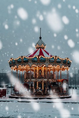 Carousel in snowy winter scene