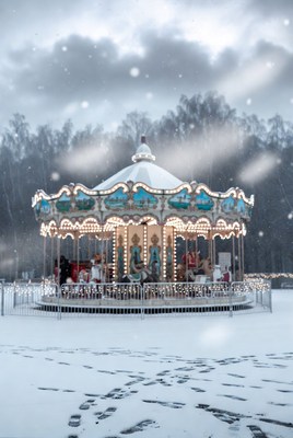 Snowy carousel in winter scenery
