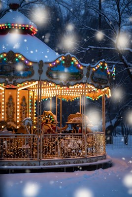 Snowy carousel with festive lights