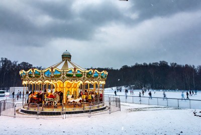 Winter carousel by skating rink