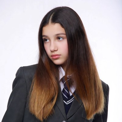 Young girl in formal attire