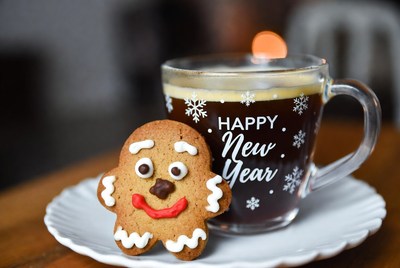 Enjoying coffee and gingerbread treat