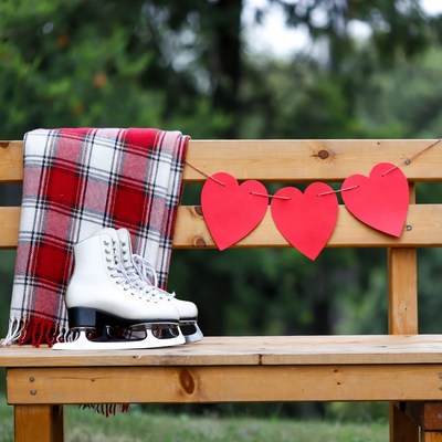 Ice skates with hearts in the park