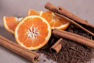 Slices of orange with cinnamon and chocolate