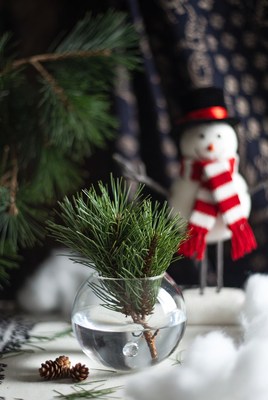 Winter decor with snowman and pine