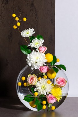 Stylish floral arrangement with lemons