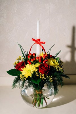 Elegant floral arrangement with candle